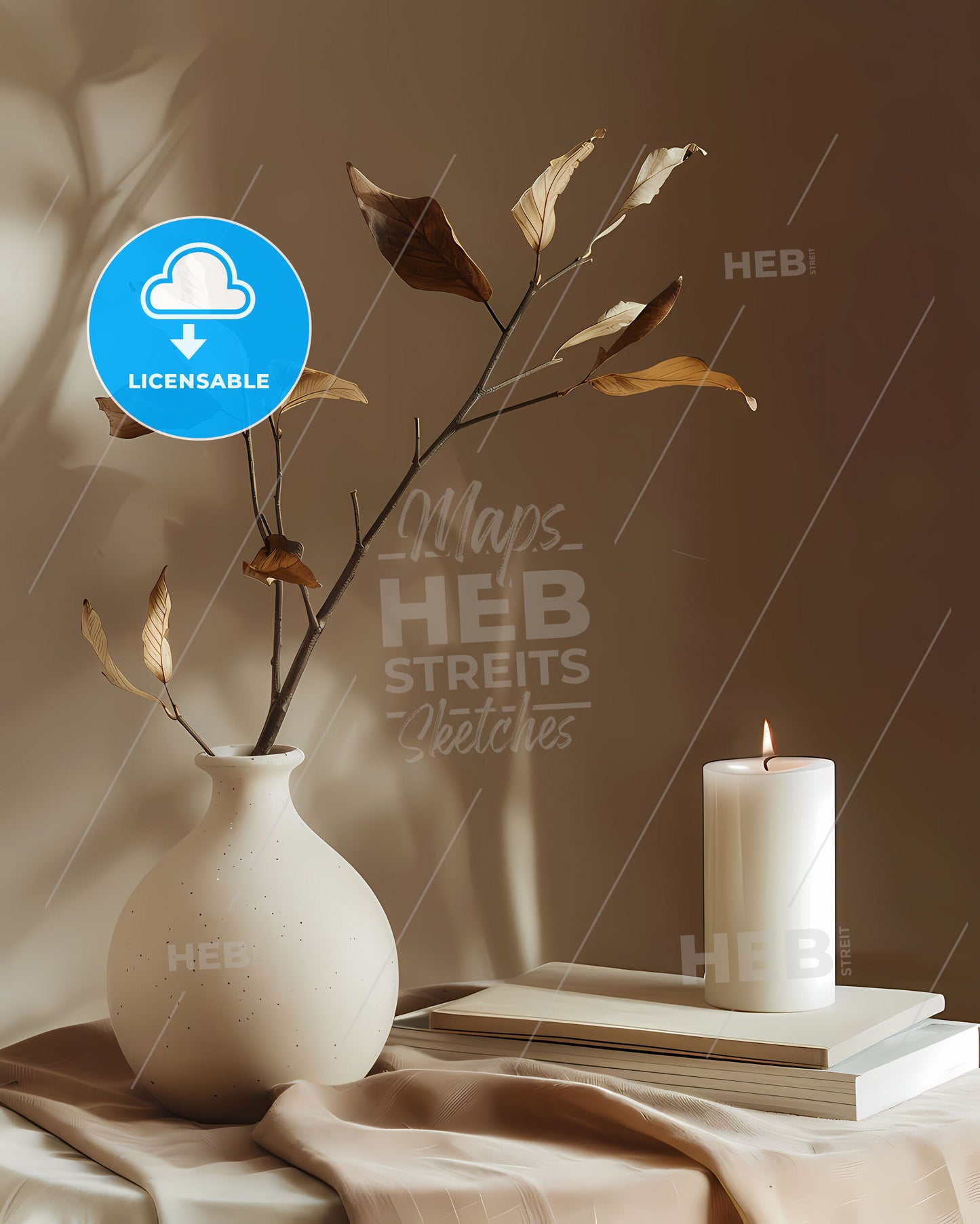 Abstract Still Life Composition: Ceramic Vase with Dried Leaves, Candle, and Books on Table Against Brown Wall