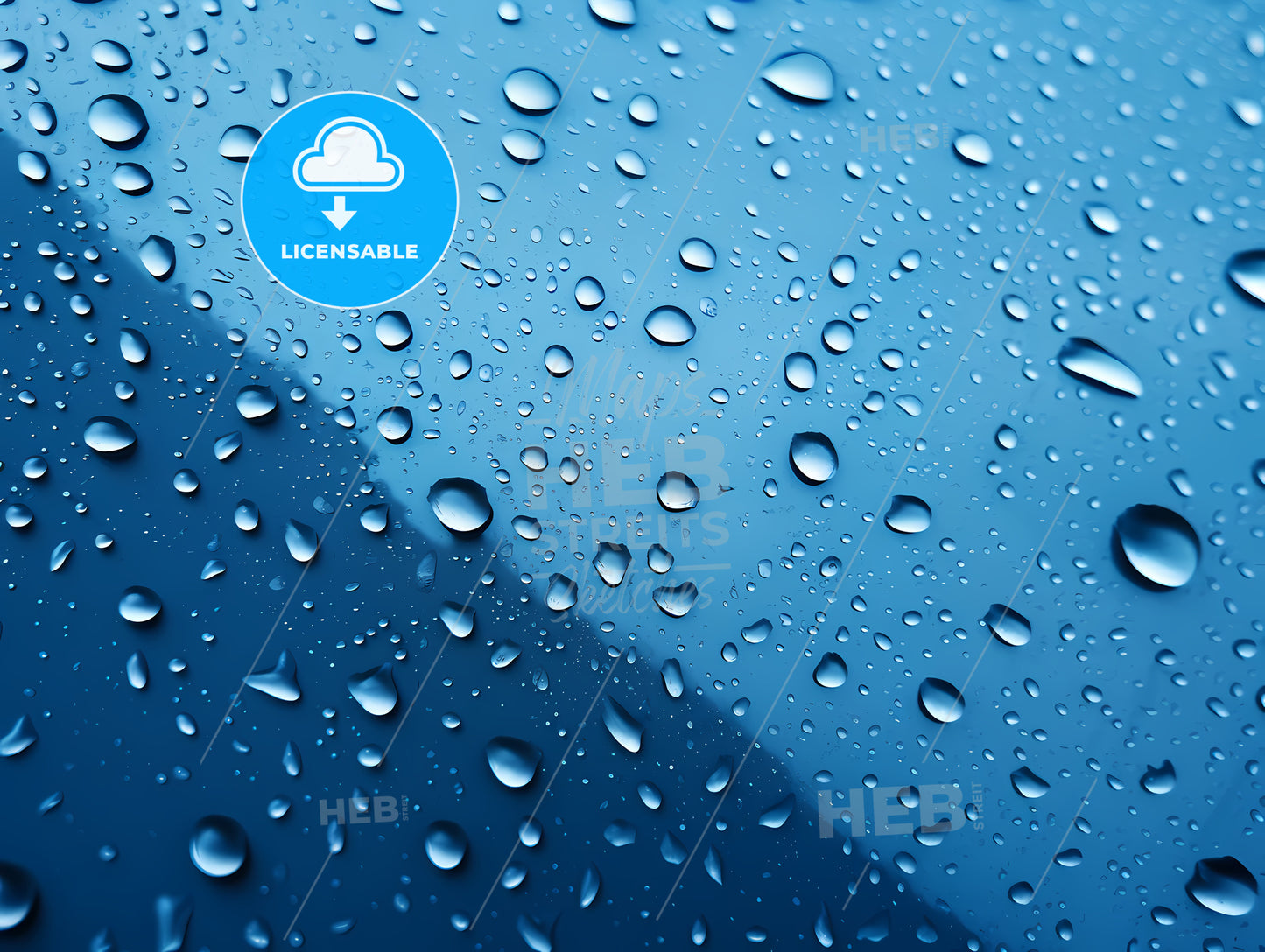 Water Droplets On A Blue Surface