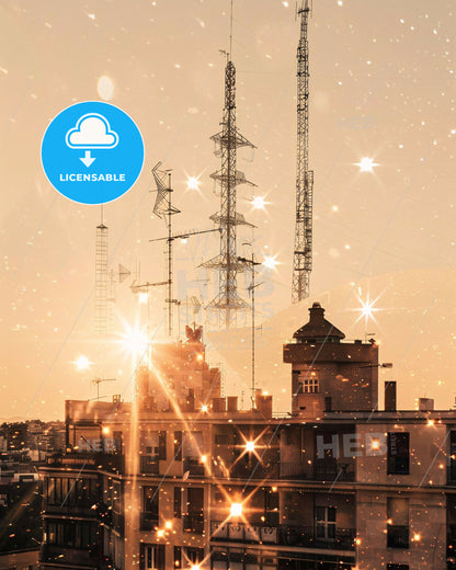 Nou Barris City Symphony in Light and Color - A group of buildings with a tower in the background