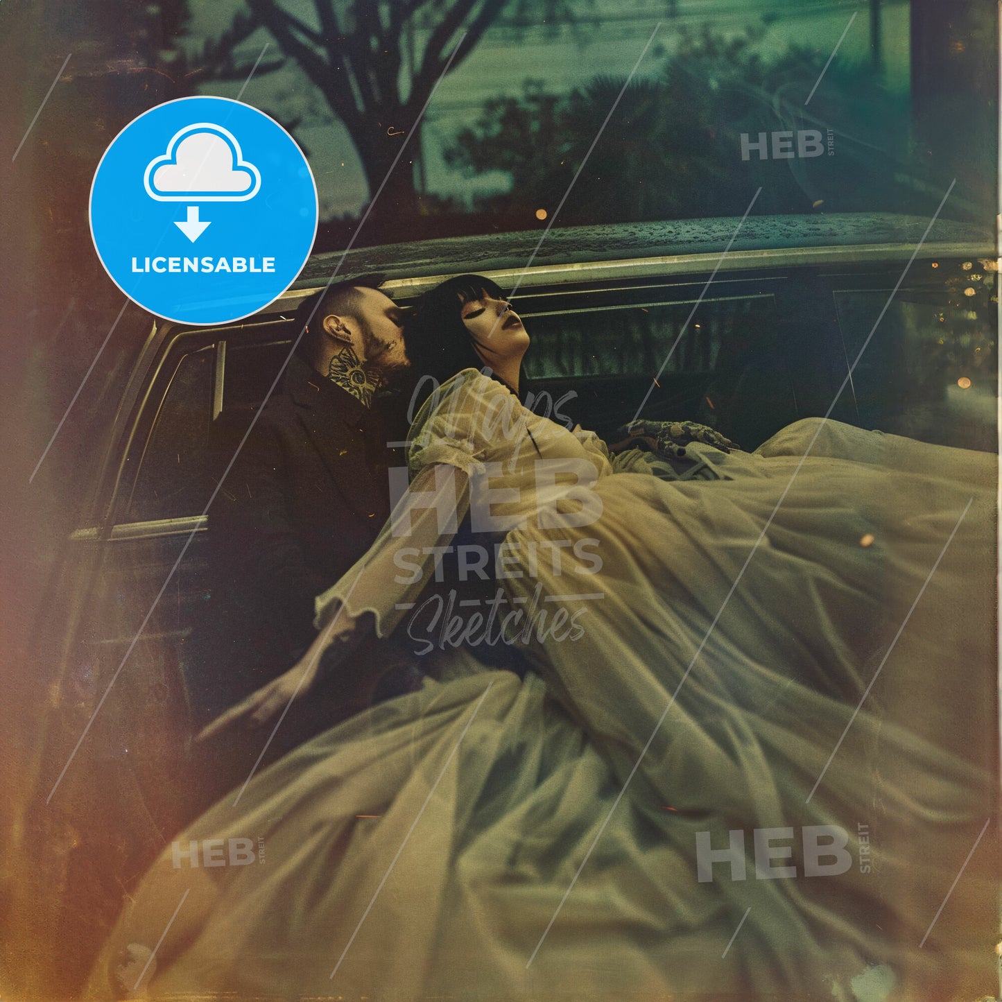 A Man And Woman In A Car