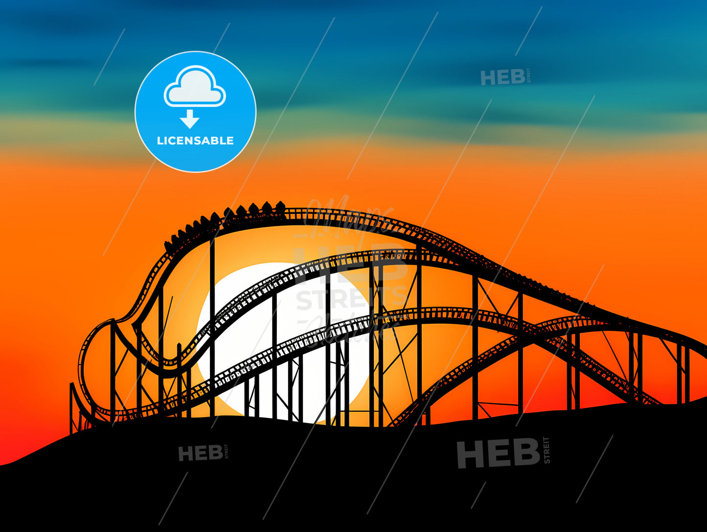 Roller coaster loop silhouetted at sunset