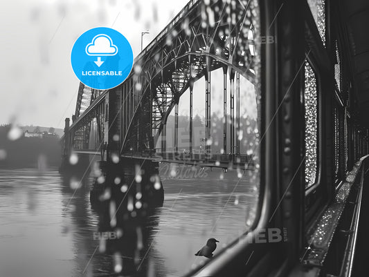 The Iconic Forth Bridge In Edinburgh, A Bridge With Water Drops On It