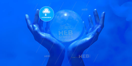 Abstract Blue Background, Metallic Mannequin Arms Hold Glass Ball With Bright Light Inside - A Pair Of Hands Holding A Blue Ball